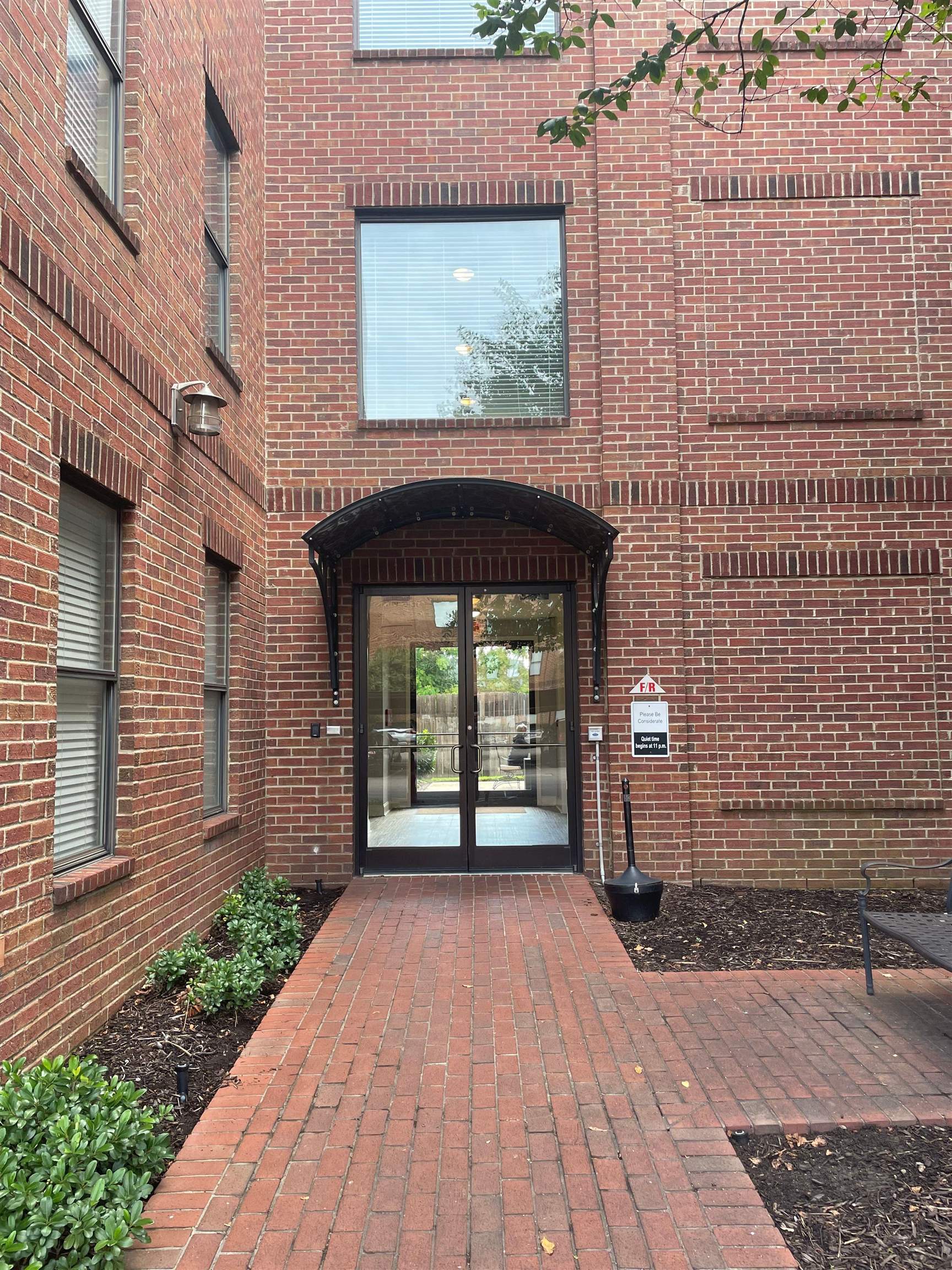 720 Litty Court, Unit 102 Memphis, TN 38103 - Photo 2 of 20 a front view of a house with a garden