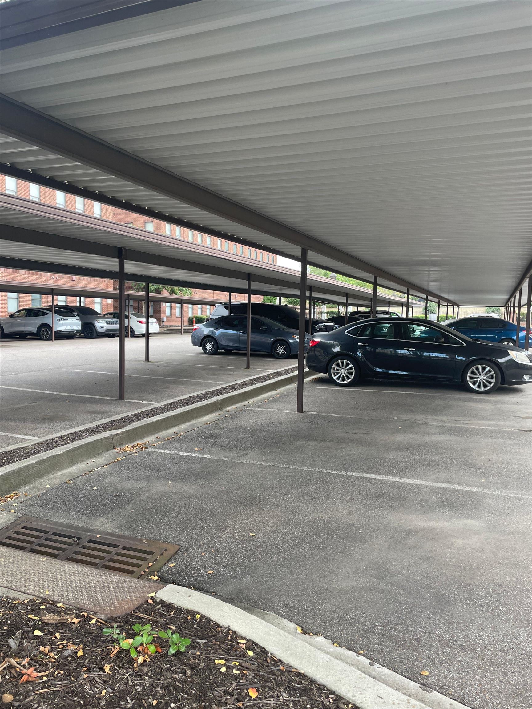 720 Litty Court, Unit 102 Memphis, TN 38103 - Photo 8 of 20 a view of parking garage with cars