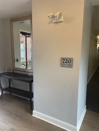 a view of a hallway with front door