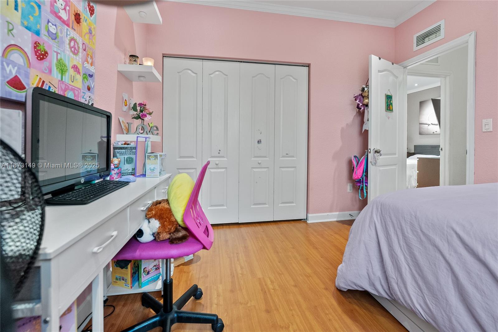 21474 Southwest 85th Path Cutler Bay, FL 33189 - Photo 23 of 30 a living room with furniture and flat screen tv