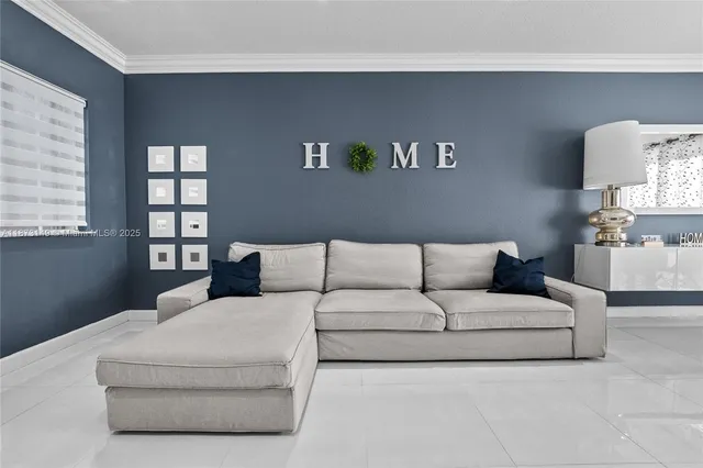 a living room with furniture and a night stand