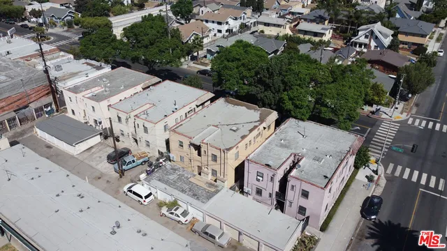 an aerial view of a house with lots of trees