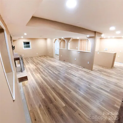 a view of a livingroom from a hallway