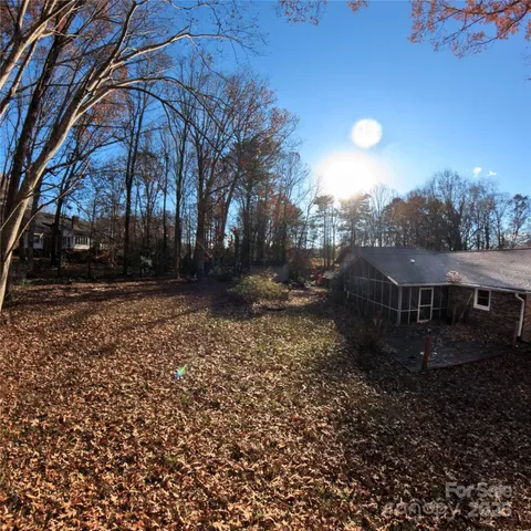 a view of backyard with green space