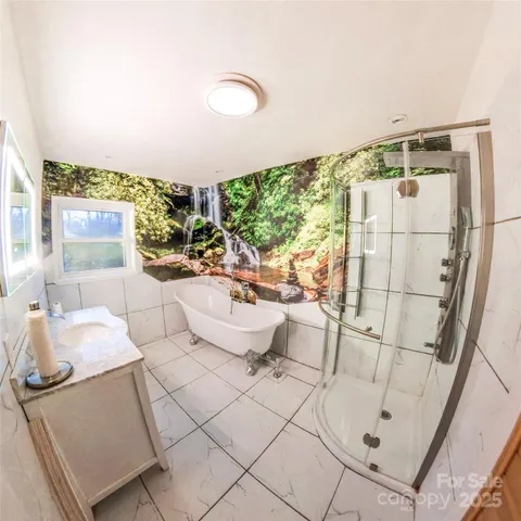 a view of balcony with floor to ceiling window and wooden floor