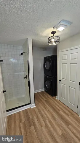a view of a hallway with a glass door