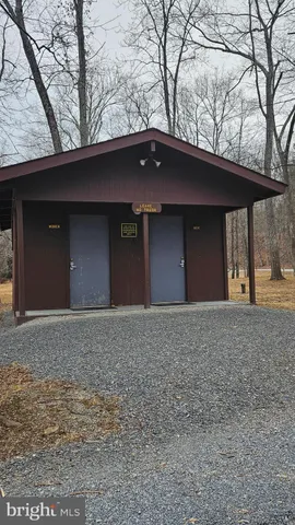 a house with trees in front of it