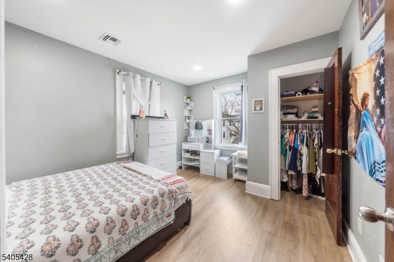 343 Dewitt Street Linden, NJ 07036 - Photo 12 of 33 a bedroom with a large bed and a view of bedroom