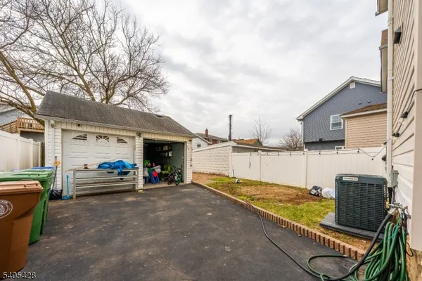 an aerial view of residential houses with city view