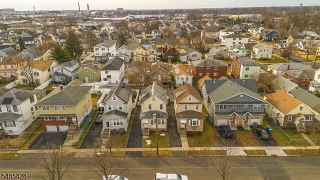 an aerial view of residential building with parking space