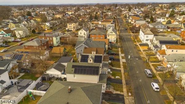 an aerial view of residential house with parking space