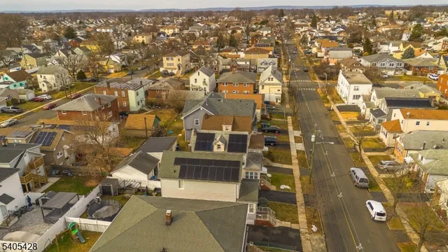 an aerial view of residential house with parking space