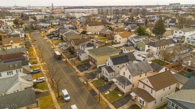 an aerial view of residential building with parking space