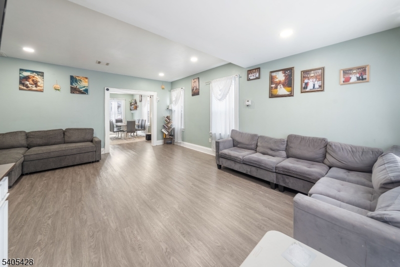 343 Dewitt Street Linden, NJ 07036 - Photo 5 of 33 a living room with furniture and wooden floor