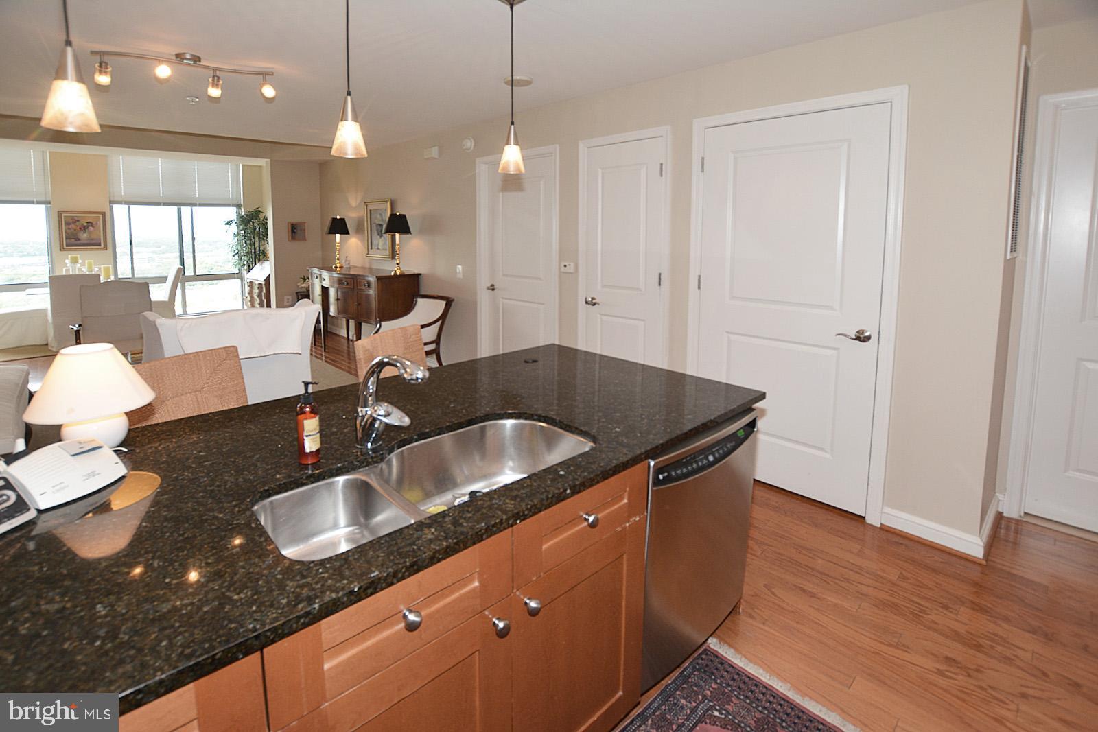 11990 Market Street, Unit 1614 Reston, VA 20190 - Photo 12 of 38 KITCHEN ISLAND