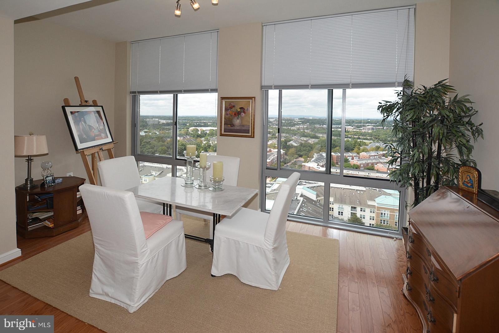 11990 Market Street, Unit 1614 Reston, VA 20190 - Photo 15 of 38 SUNROOM/SEPARATE DINING ROOM WITH AWESOME VIEW