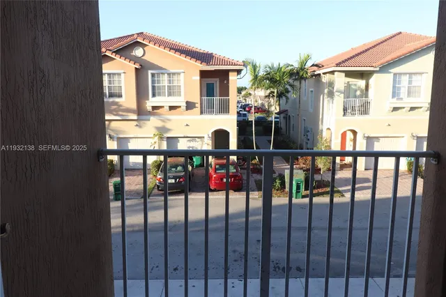 a view of a kitchen cabinets and a counter top space