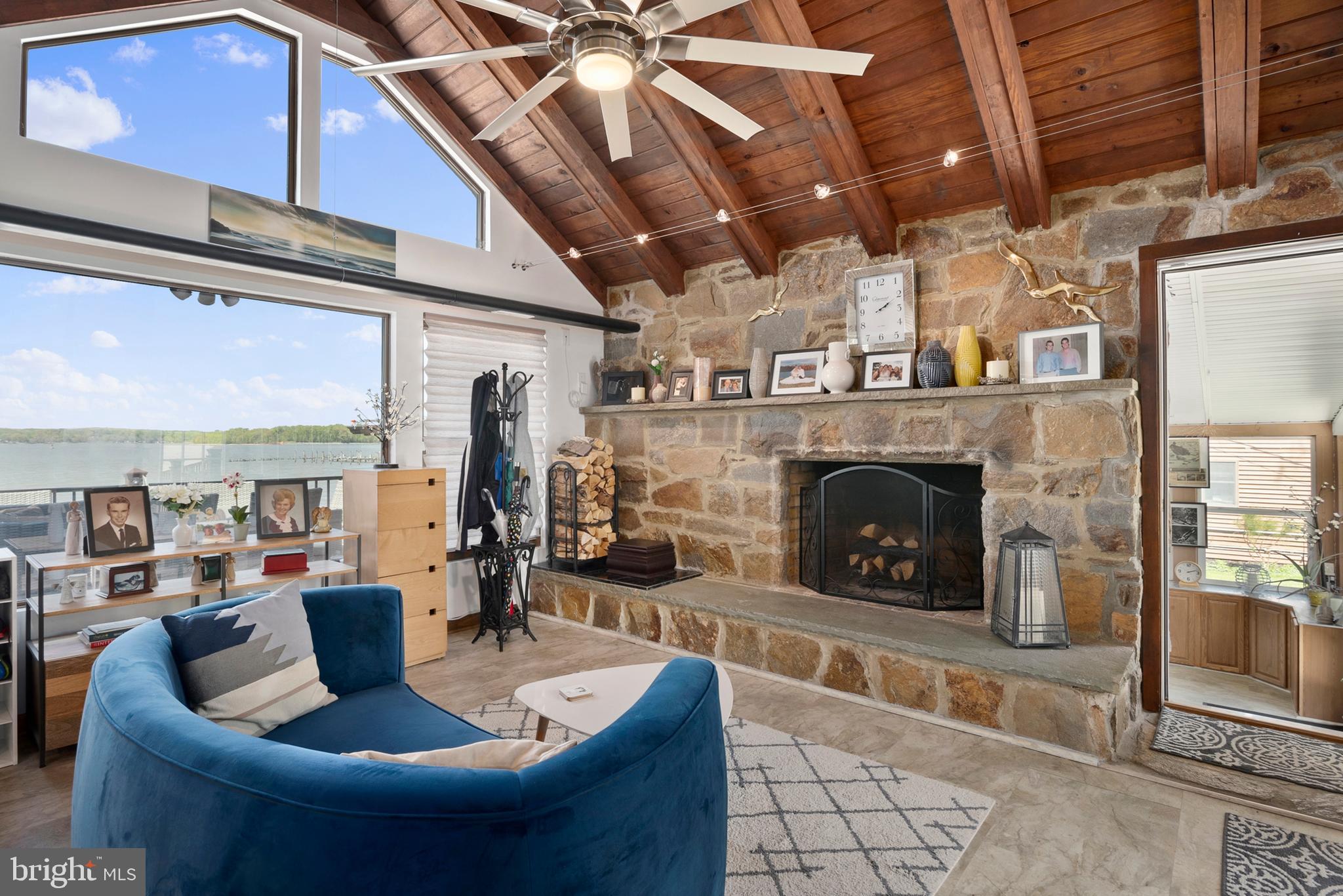 71 River Road Chesapeake City, MD 21915 - Photo 17 of 74 Stone Fireplace with Cathedral Beamed ceiling
