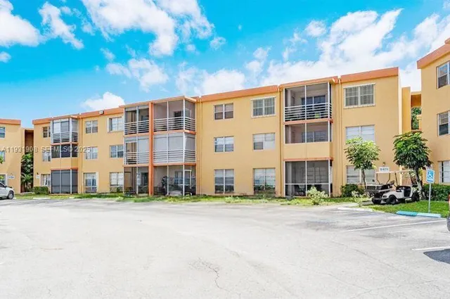a front view of a building with a street
