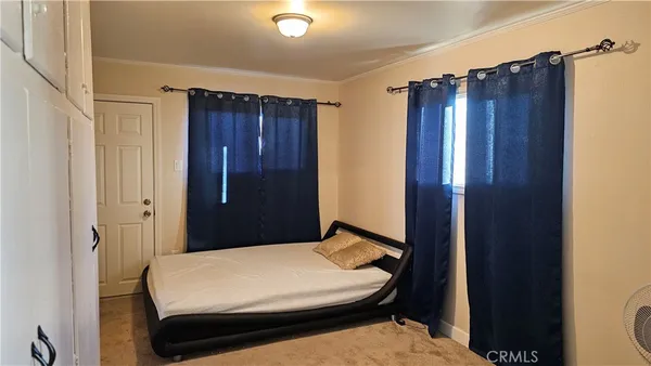 a bathroom with a shower and a mirror