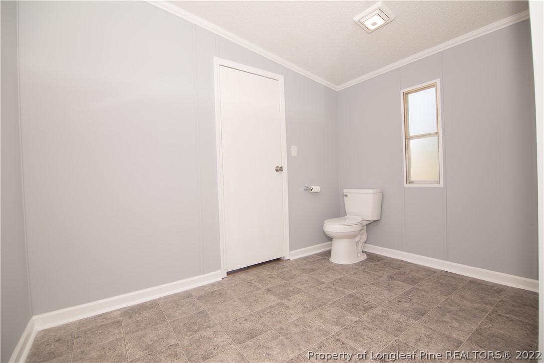 516 West Northpoint Road Spring Lake, NC 28390 - Photo 30 of 41 a view of a bathroom with a toilet