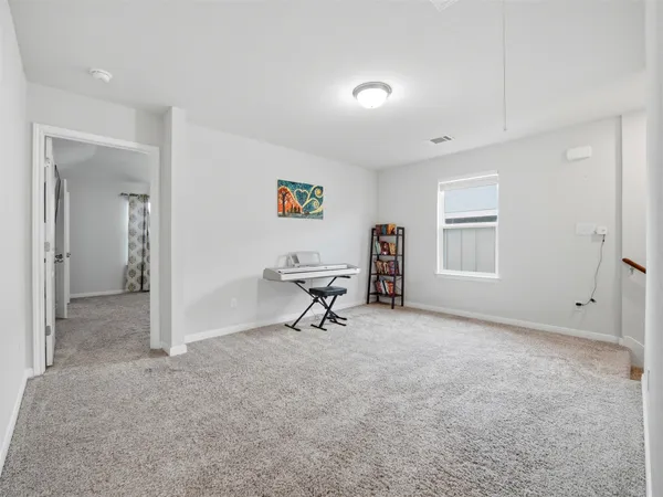 a view of a livingroom with a furniture and a window