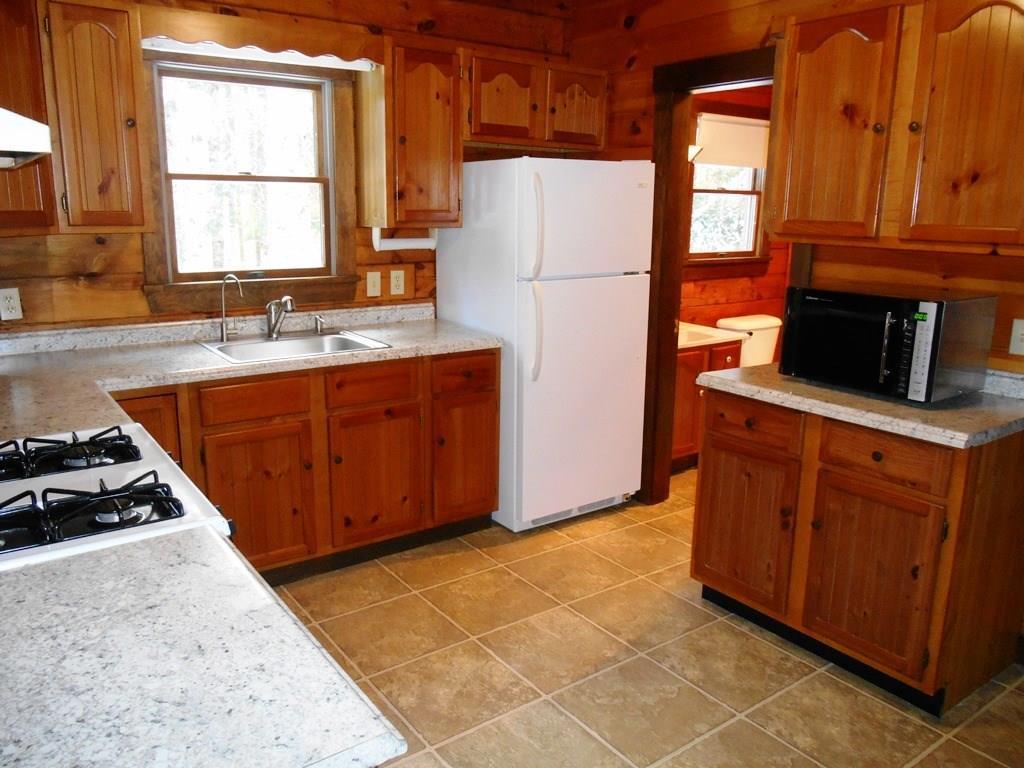 30 Dodge Pond Road Rangeley, ME 04970 - Photo 6 of 35 Updated counter tops, drawer pulls,...