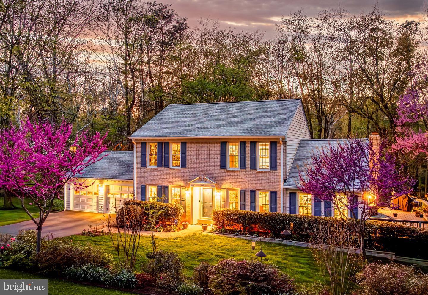 10812 Hunt Club Road Reston, VA 20190 - Photo 1 of 74 Charming home embraced by spring blooms.