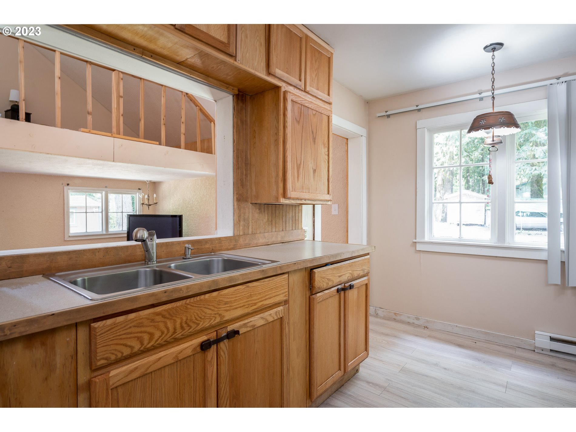24995 East Old Smokey Road Rhododendron, OR 97049 - Photo 17 of 39 a kitchen that has a sink and a window