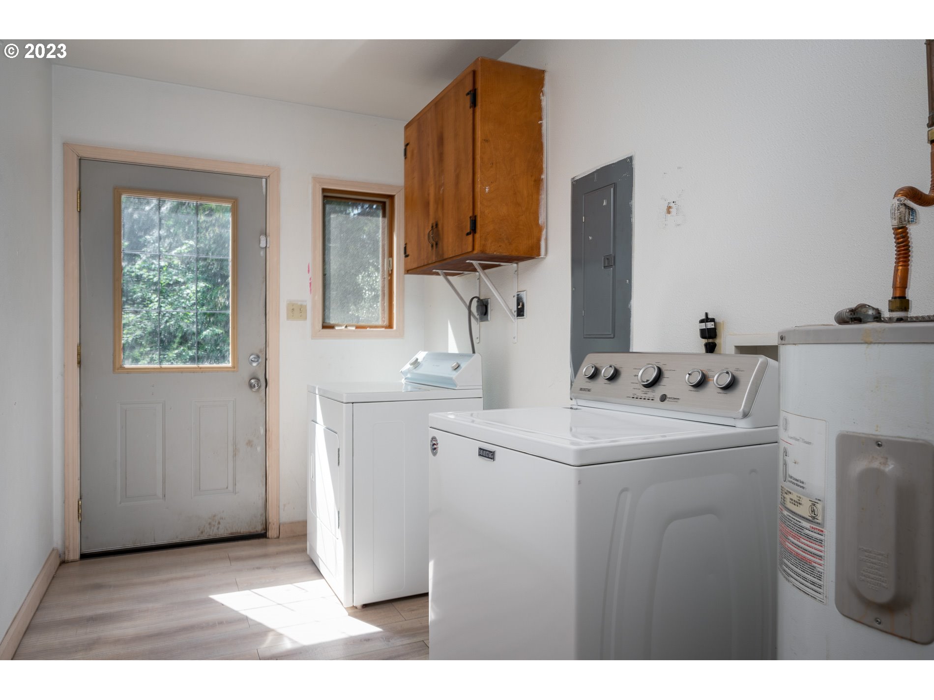 24995 East Old Smokey Road Rhododendron, OR 97049 - Photo 18 of 39 a utility room with closet dryer and washer