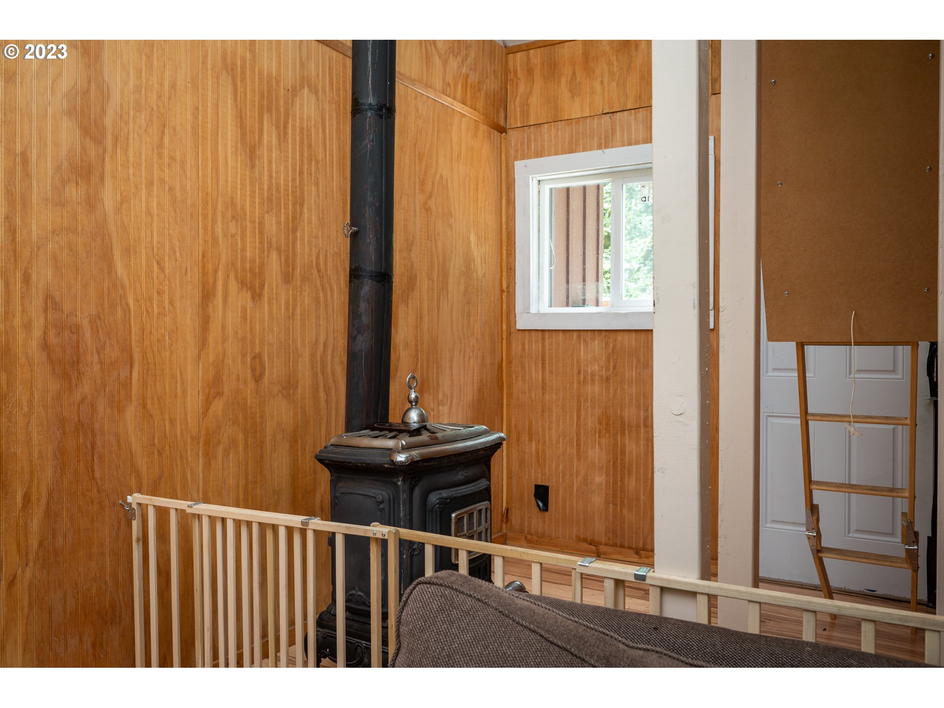 24995 East Old Smokey Road Rhododendron, OR 97049 - Photo 22 of 39 a view of a door and chair