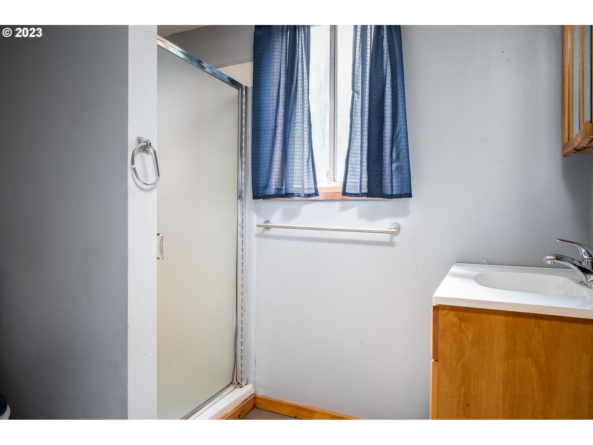 24995 East Old Smokey Road Rhododendron, OR 97049 - Photo 23 of 39 a bathroom with a sink and a mirror