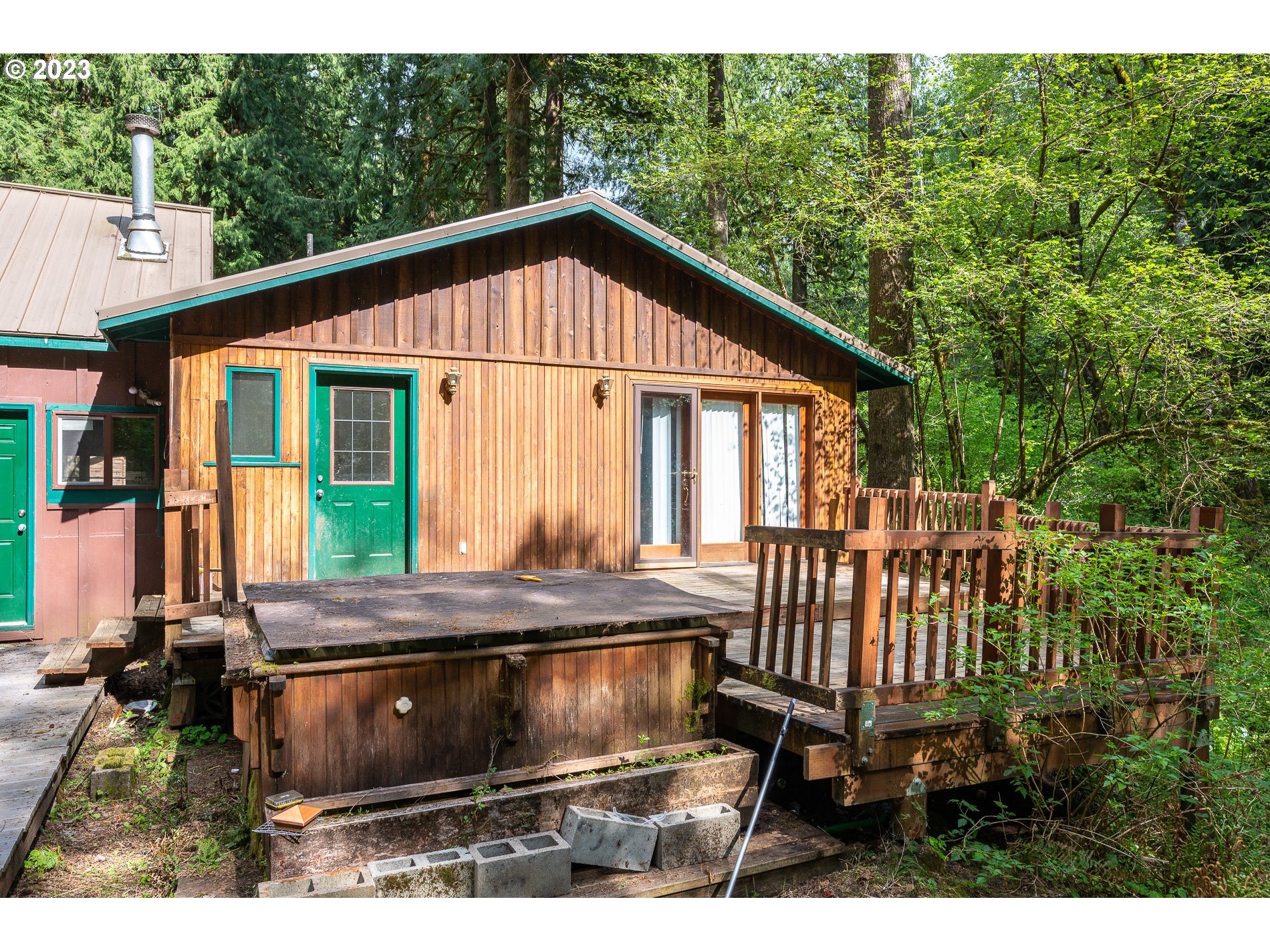24995 East Old Smokey Road Rhododendron, OR 97049 - Photo 29 of 39 a view of backyard with deck and outdoor seating