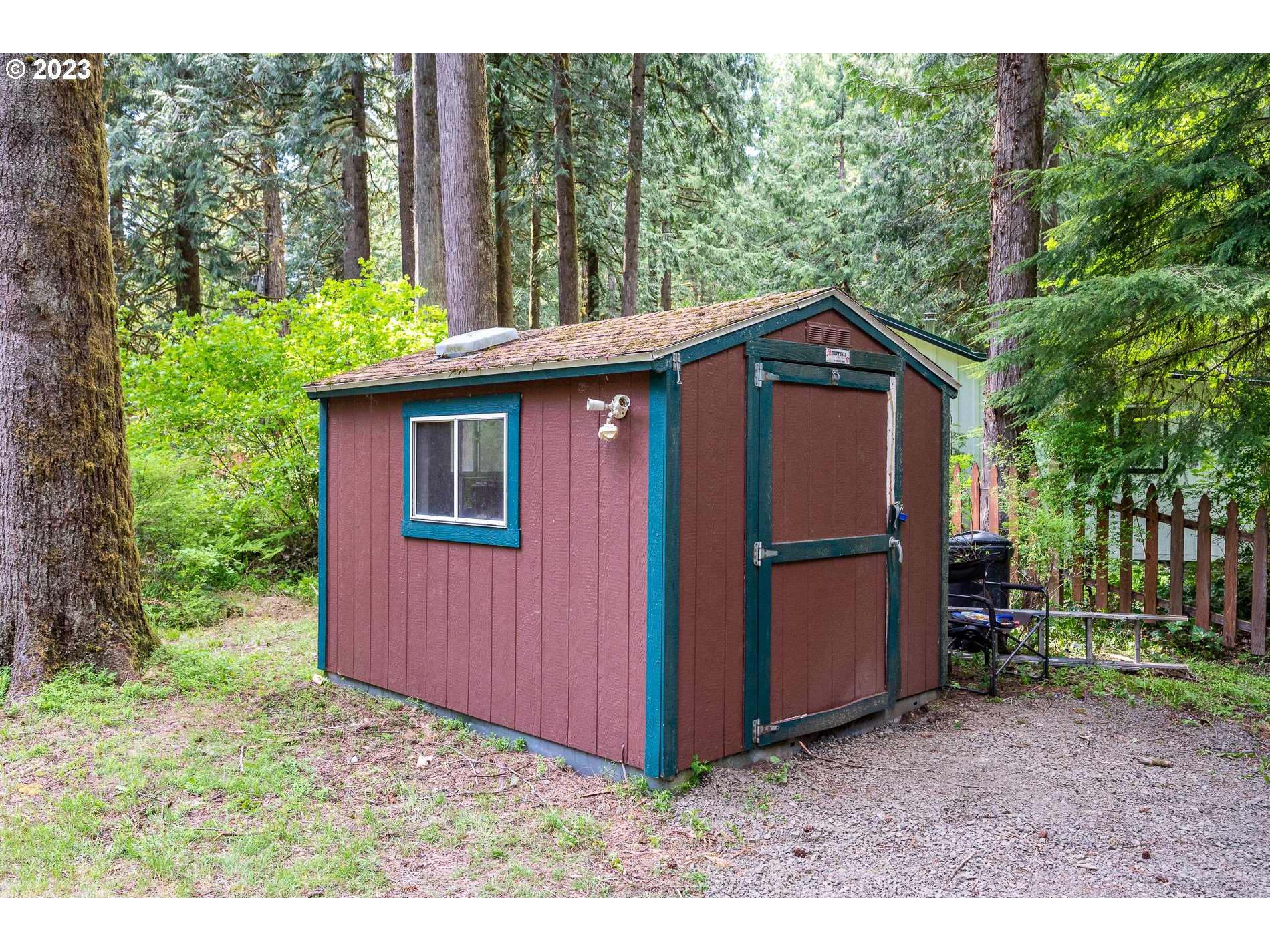 24995 East Old Smokey Road Rhododendron, OR 97049 - Photo 34 of 39 a front view of a house with garden
