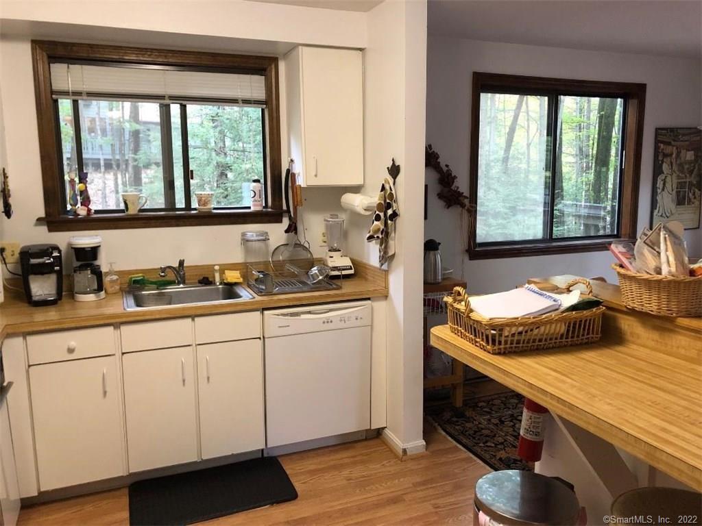 355 Ledge Drive, Unit 355 Torrington, CT 06790 - Photo 1 of 1 Corner Woodhaven home with three definite bedrooms, 2 full baths, kitchen with eating bar, laminate floors.