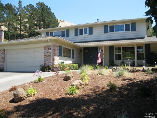 8 Corte La Paz San Rafael, CA 94903 - Photo 1 of 1 a front view of a house with a yard and seating space