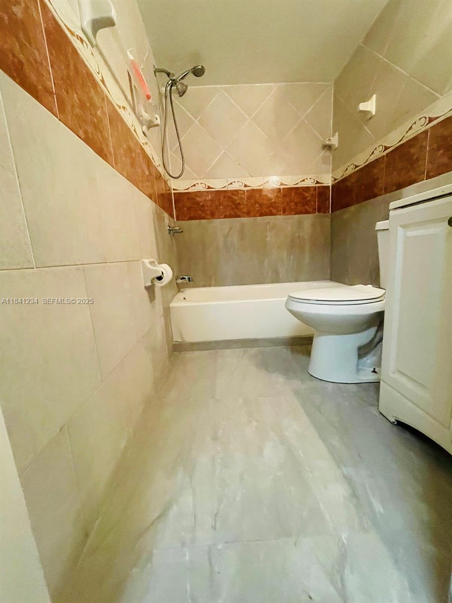 1238 Southwest 4th Street Miami, FL 33135 - Photo 25 of 27 a bathroom with a toilet and a shower