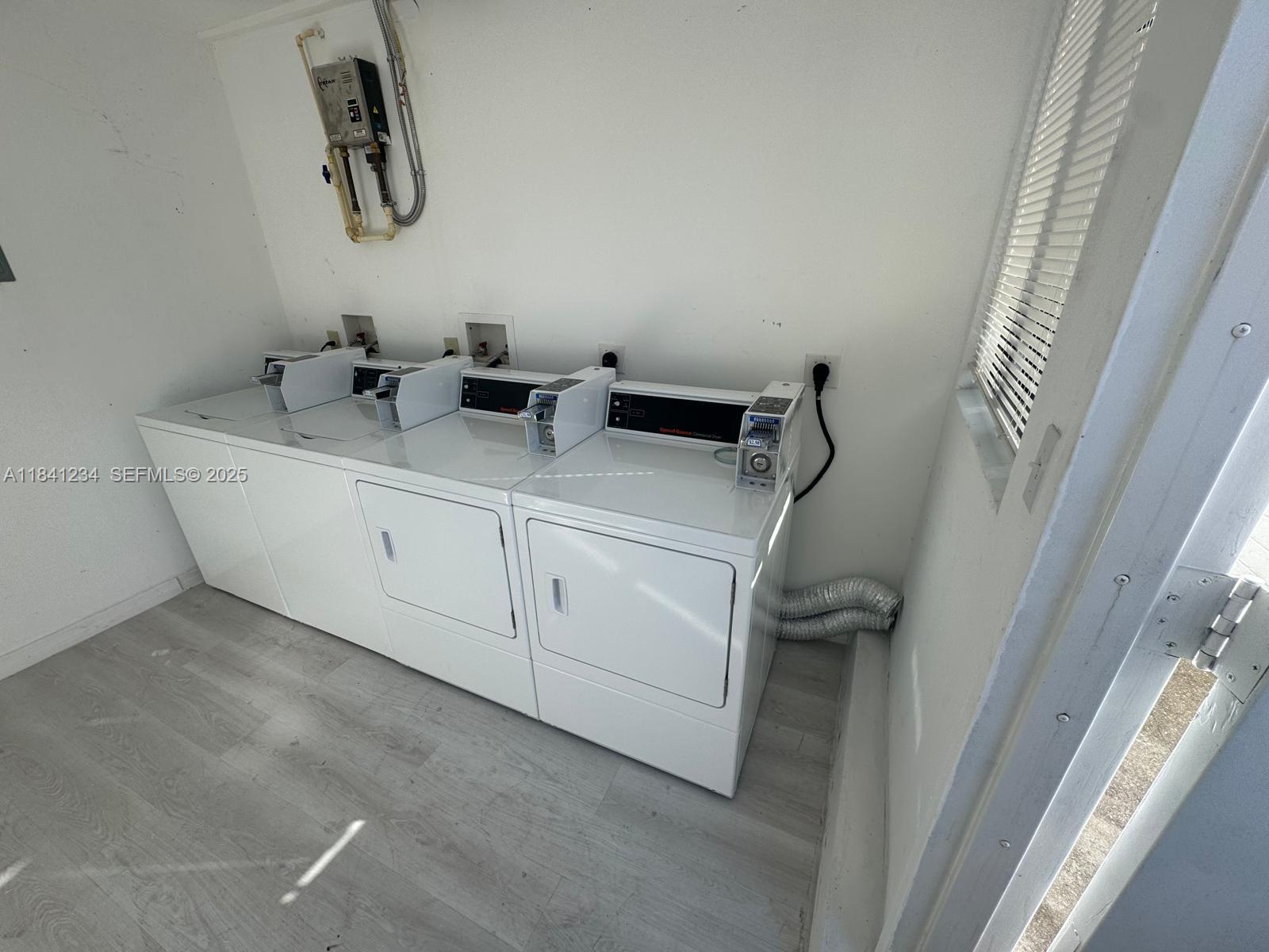1238 Southwest 4th Street Miami, FL 33135 - Photo 27 of 27 a bathroom with a sink and mirror