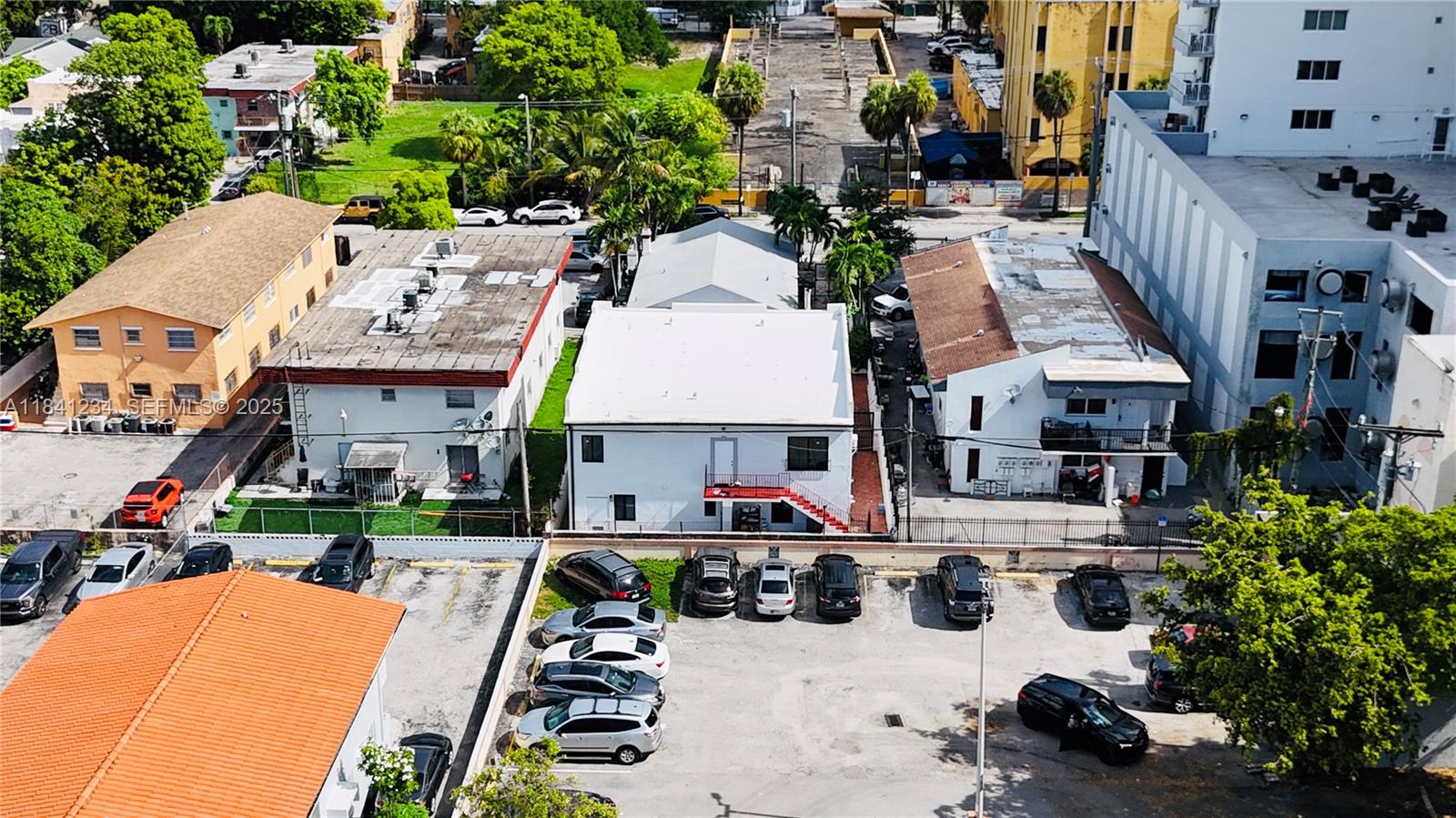1238 Southwest 4th Street Miami, FL 33135 - Photo 4 of 27 an aerial view of a house with garden and parking space