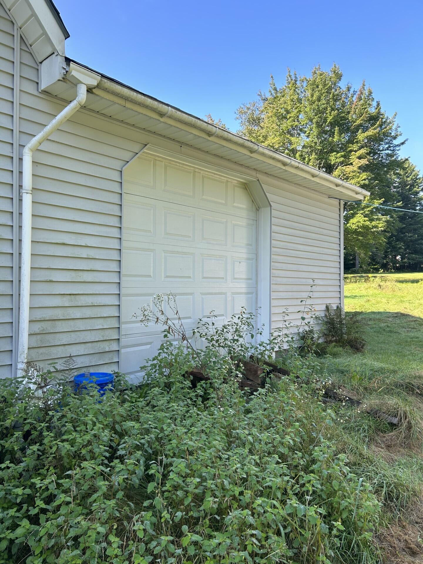 535 Boothby Road Livermore, ME 04253 - Photo 5 of 35 0387 rear of garage drive thru