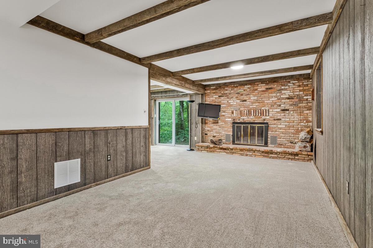 9638 Ridge View Drive North Beach, MD 20714 - Photo 11 of 53 Large Family room with fresh carpet