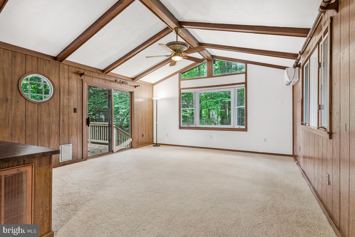 9638 Ridge View Drive North Beach, MD 20714 - Photo 10 of 53 Large Living room goes to exterior deck