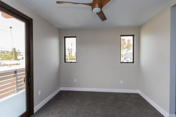 an empty room with windows