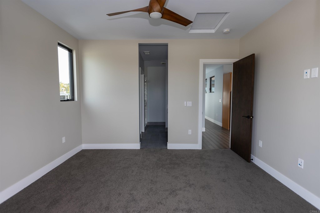 1136 South Coast Highway 101 Encinitas, CA 92024 - Photo 14 of 18 an empty room that has a window in it
