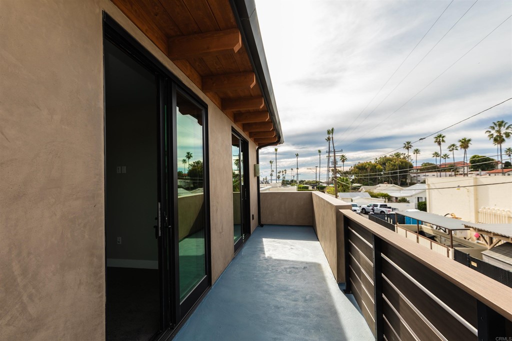 1136 South Coast Highway 101 Encinitas, CA 92024 - Photo 5 of 18 a view of a kitchen with a stove