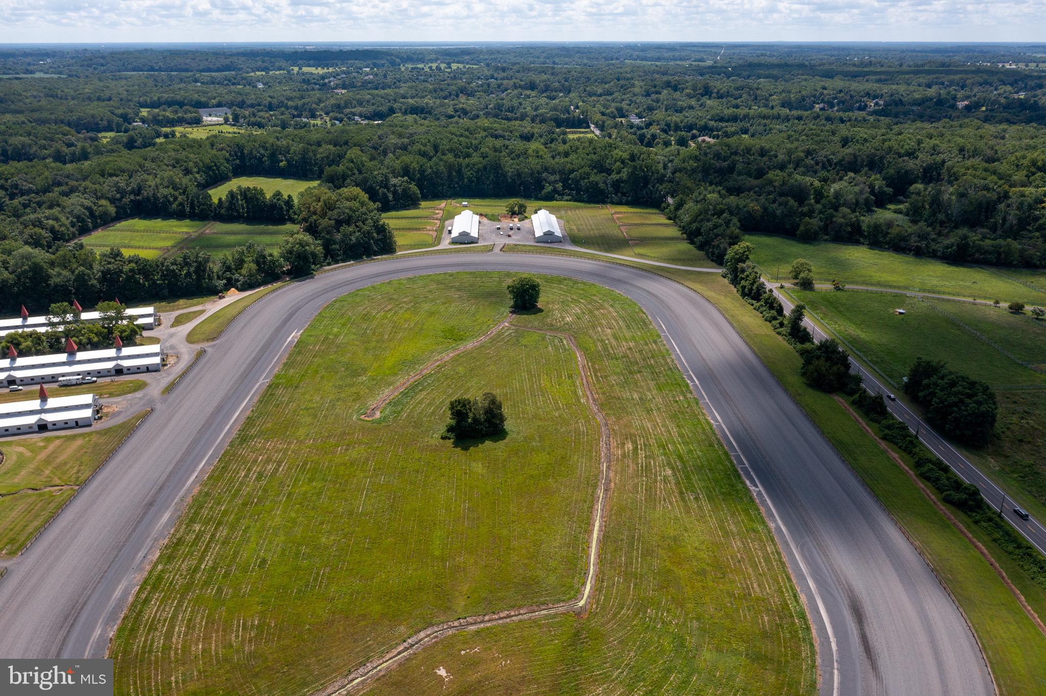 199 Bordentown Georgetown Road Chesterfield, NJ 08515 - Photo 11 of 47 a view of a swimming pool with a garden