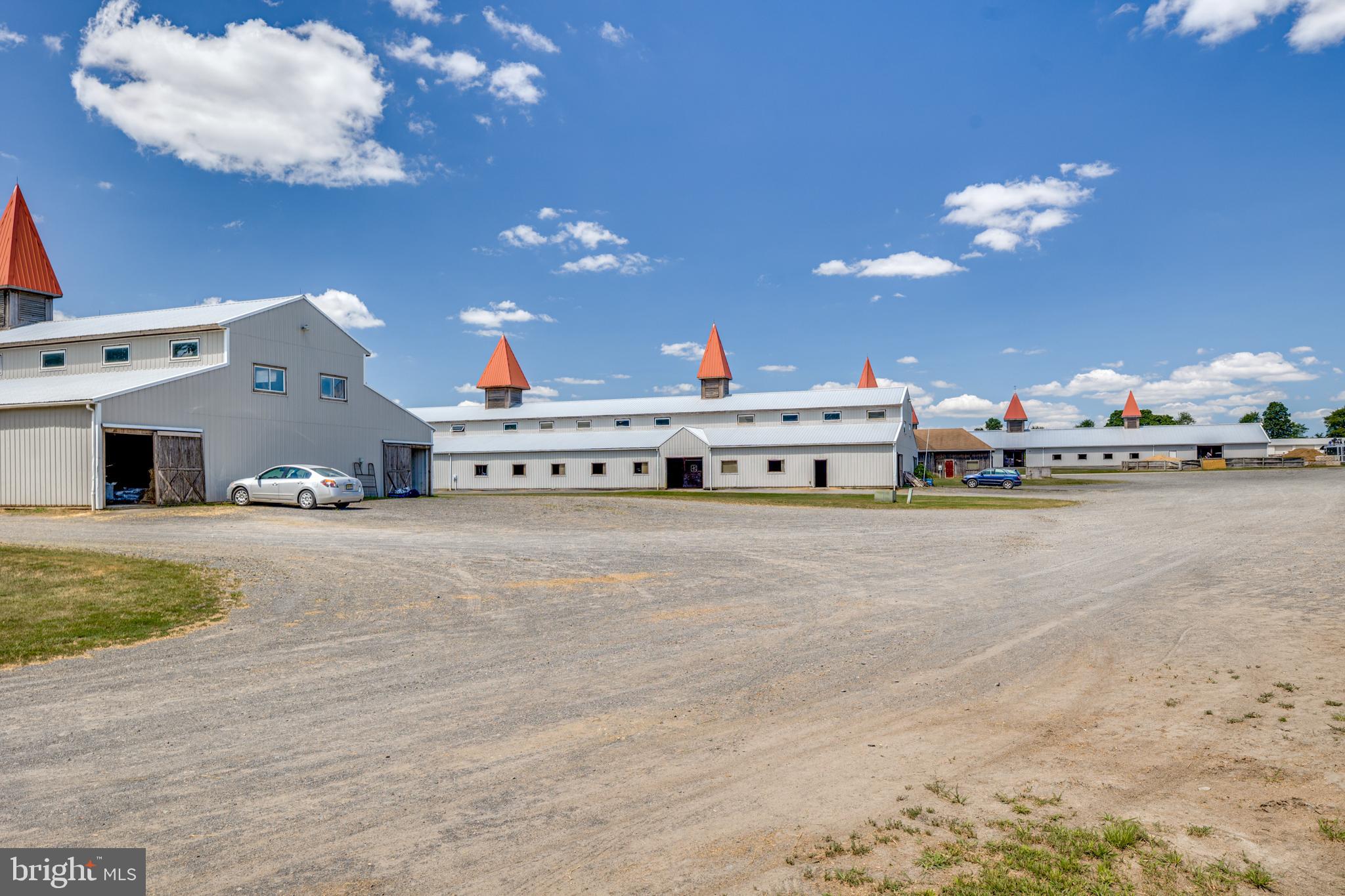199 Bordentown Georgetown Road Chesterfield, NJ 08515 - Photo 29 of 47 a white kitchen with a stove and a chandelier