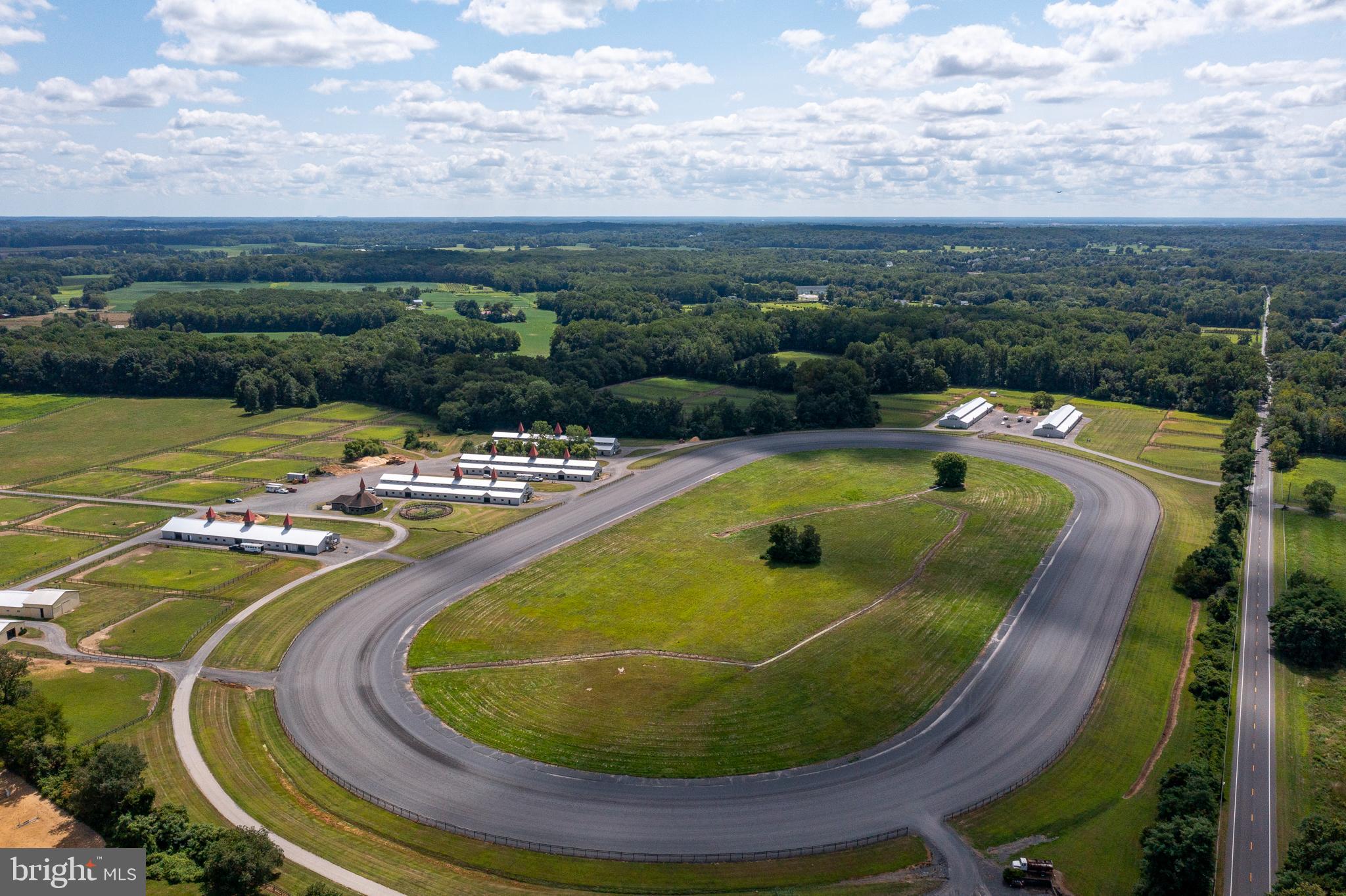 199 Bordentown Georgetown Road Chesterfield, NJ 08515 - Photo 8 of 47 a view of a swimming pool with a lounge chair