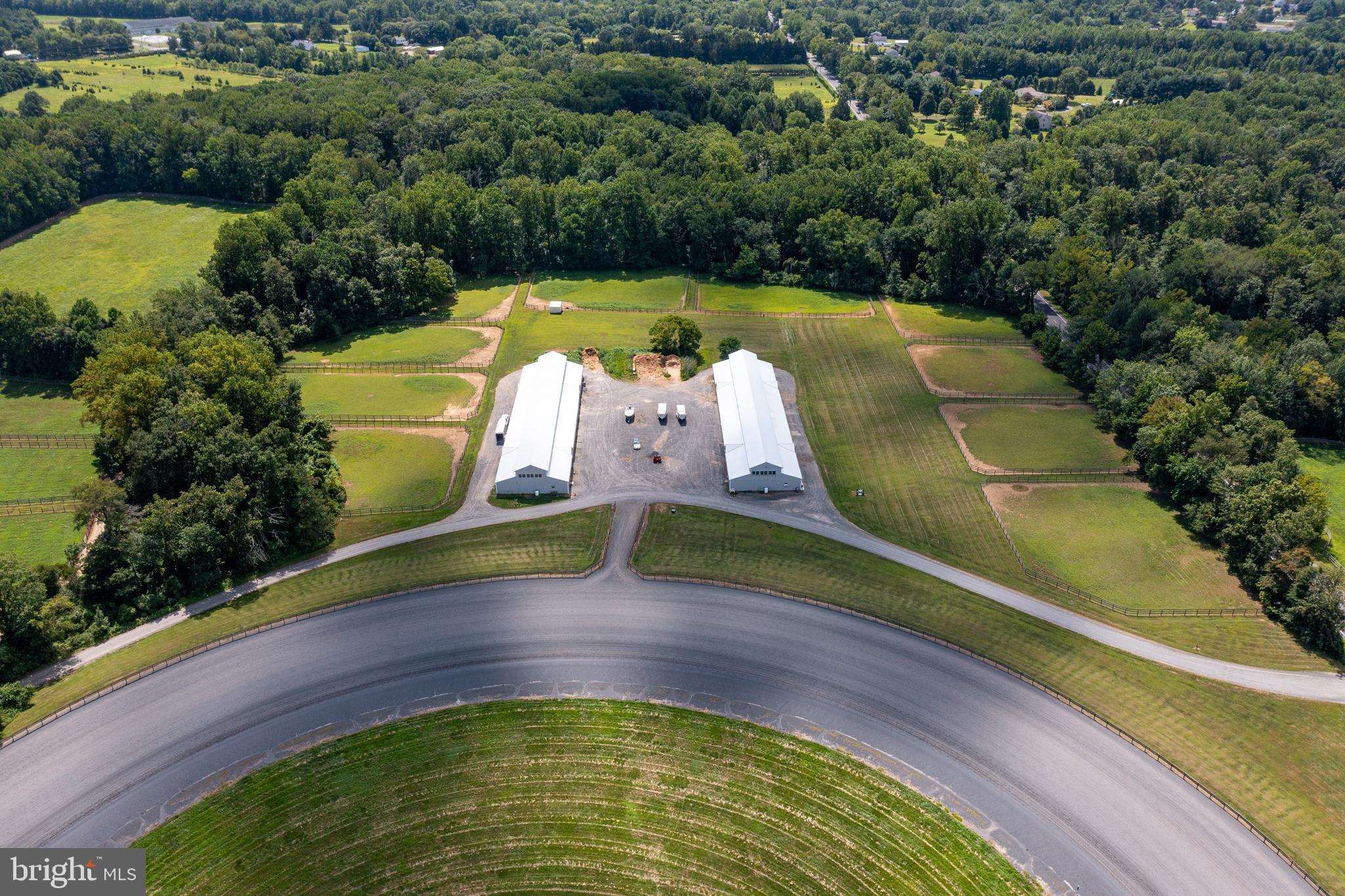 199 Bordentown Georgetown Road Chesterfield, NJ 08515 - Photo 10 of 47 an aerial view of a swimming pool with a yard