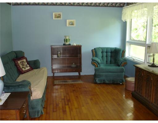 990 Grindstone Road Stacyville, ME 04777 - Photo 12 of 15 Living Room. Beautiful hardwood floor.